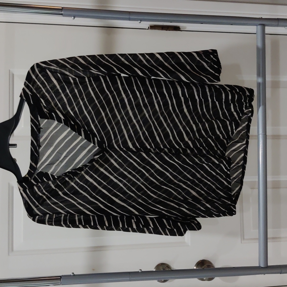 The limited sheer black white strips top